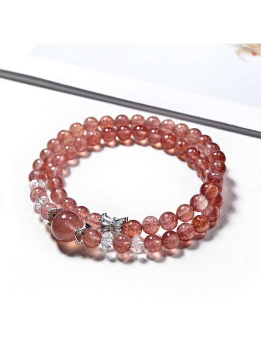 Lovra multi-wrap bracelet featuring polished strawberry quartz beads and silver accents