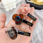 Beau hair clip worn in blonde hair styled in loose waves