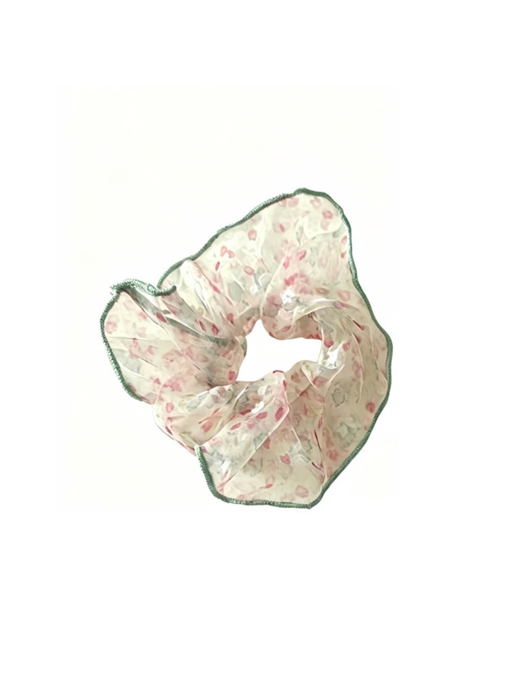 Close-up of Gifty sheer tulle scrunchie showing delicate tiny floral design and soft fabric texture