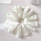 Elegant white tulle scrunchie with gathered fabric detail