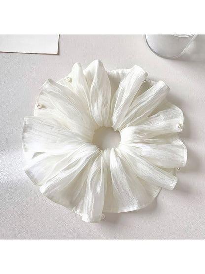 Elegant white tulle scrunchie with gathered fabric detail