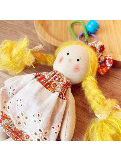 Close-up of Keypus cartoon doll keychain face with expressive eyes and smile
