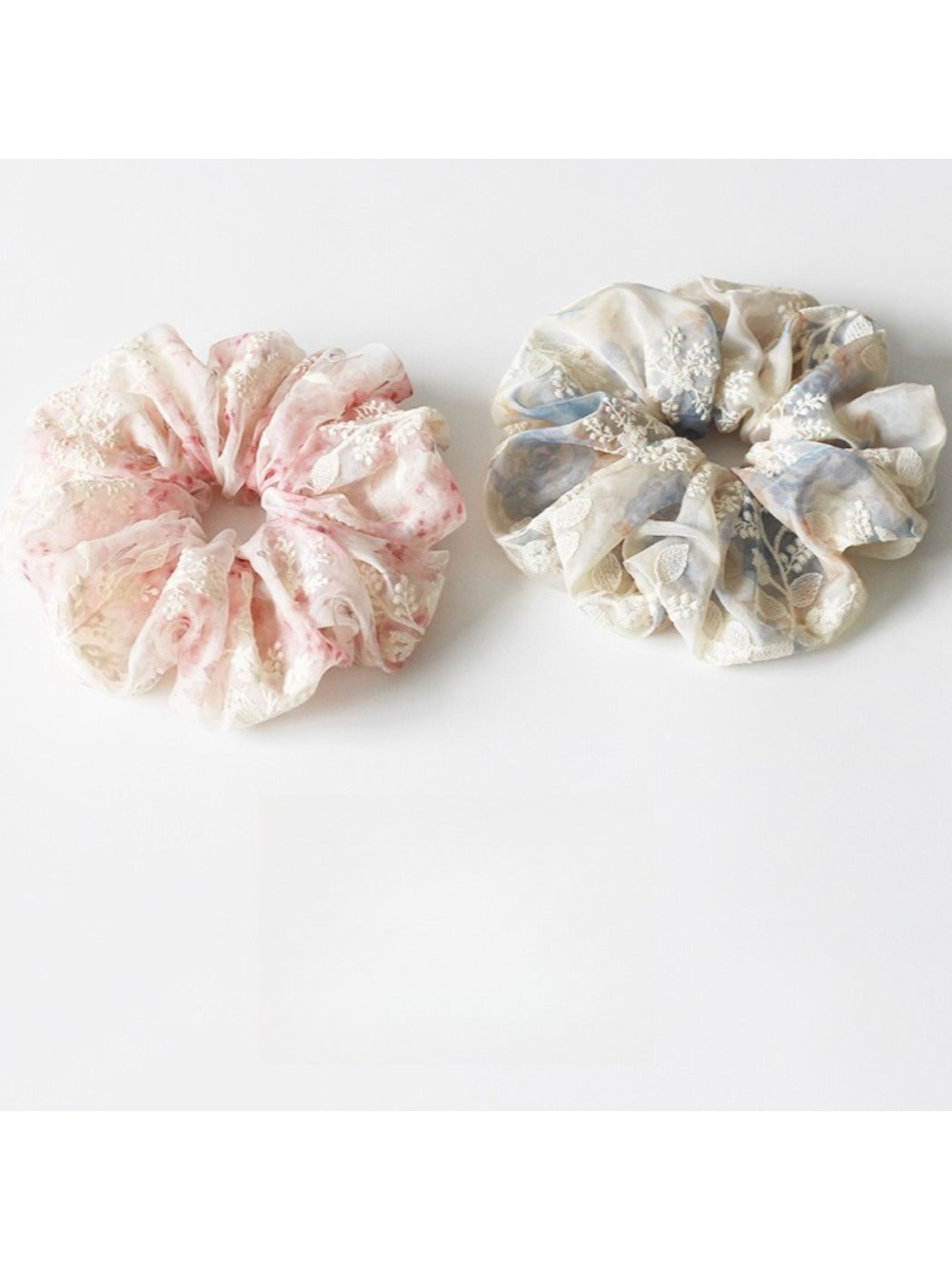 Side view of Gifty scrunchie highlighting ruched design and elastic band