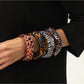 Close-up of Lovra leopard print bangle showing textured pattern and curved design