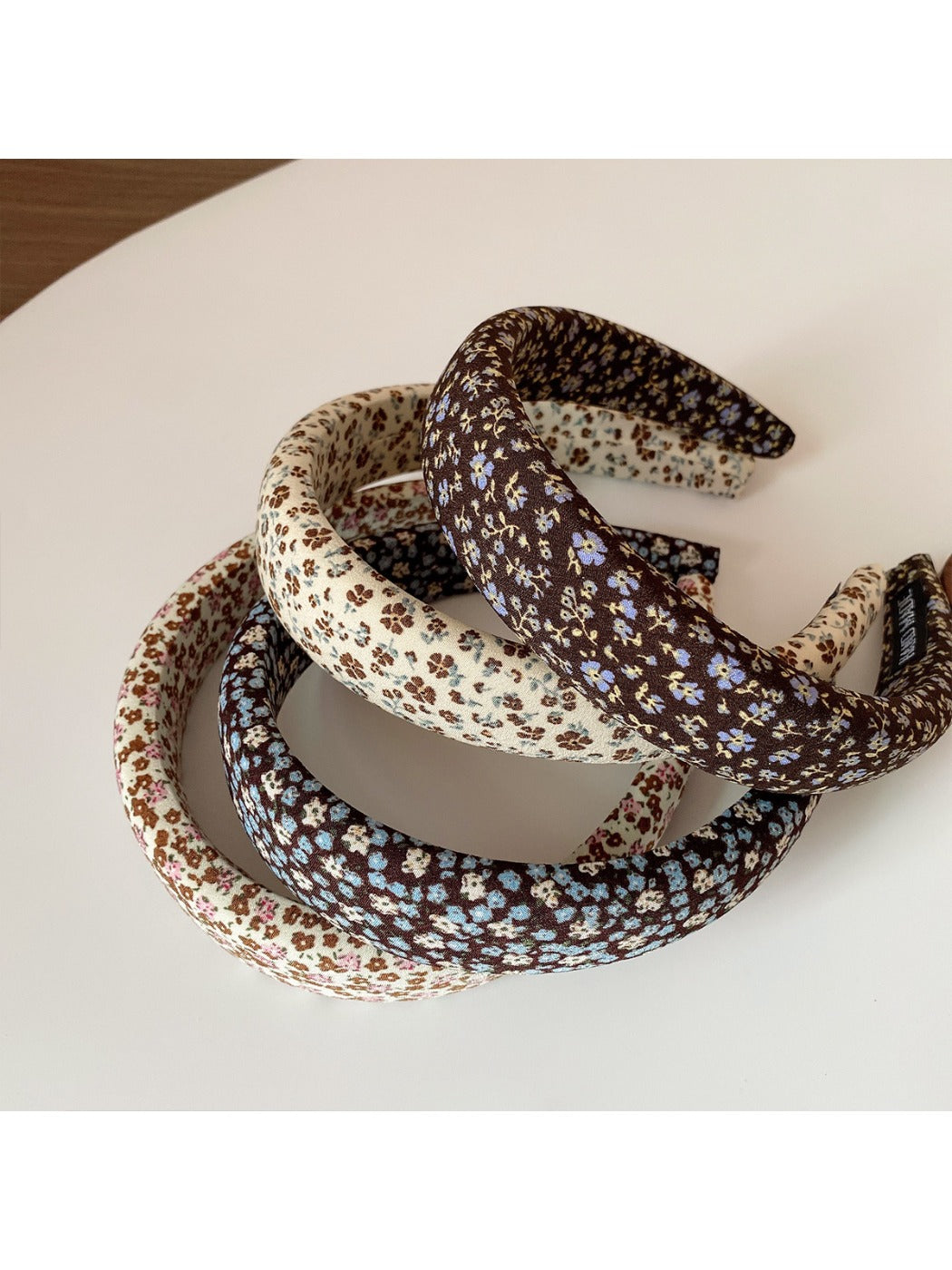 Close-up of Gifty headband showing detailed vintage floral pattern