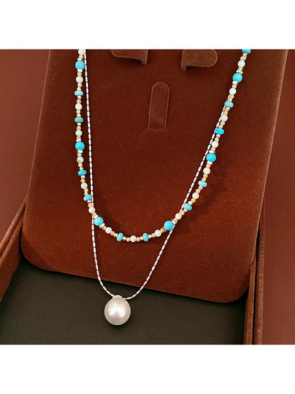 Nozari - Layered Beaded Round Pendant Necklace