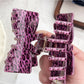 Beau leopard print claw clip holding hair in a half-up hairstyle