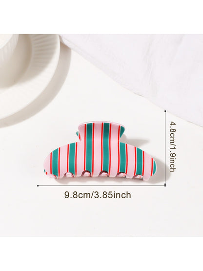 Beau colorful striped claw clip open showing metal spring mechanism