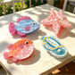 Beau sea animal shaped claw clip in pastel blue with textured details
