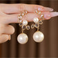 Earedge - Modern Curved Round Drop Look Stud Earrings