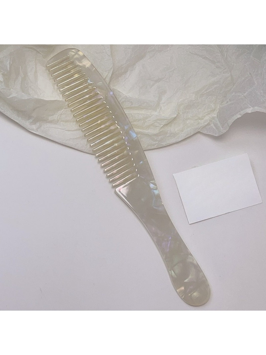 Camerow long handle hair comb with a focus on the handle grip texture