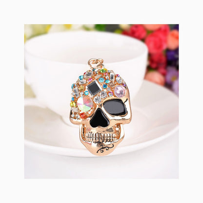 Gold-tone multicolor faceted skull keychain front view