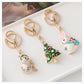 Christmas tree, snowman, stocking and rabbit keychains