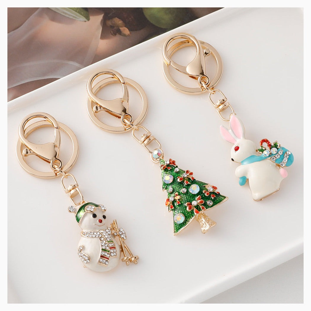 Christmas tree, snowman, stocking and rabbit keychains