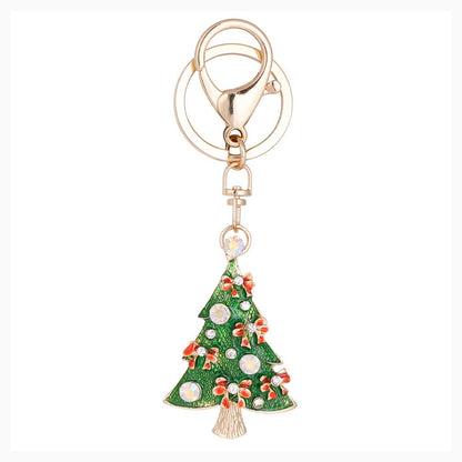 Green Christmas tree keychain on white background