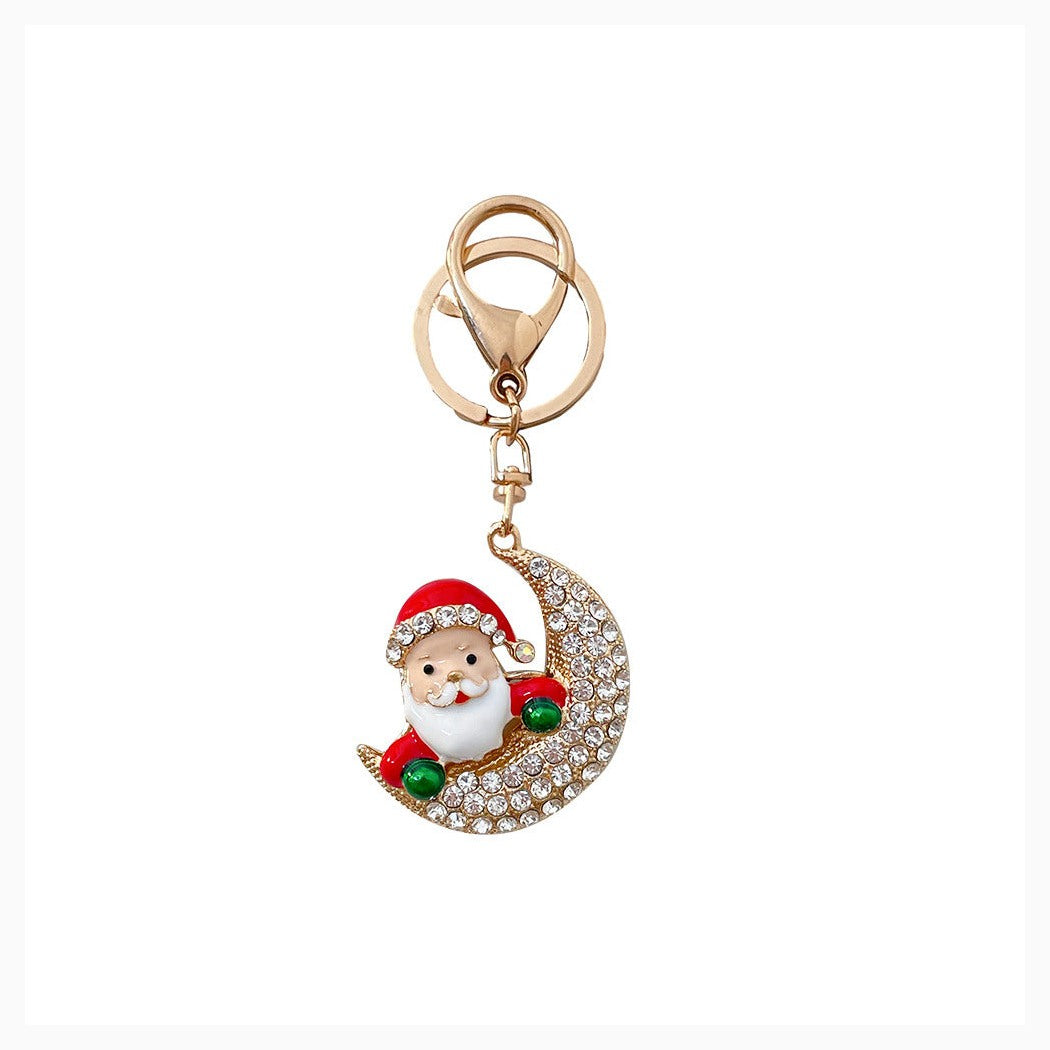 Christmas Santa crescent moon keychain on white background