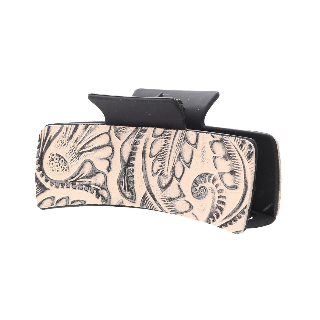 Ivory floral hair claw on white background