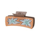 Blue floral hair claw on white background