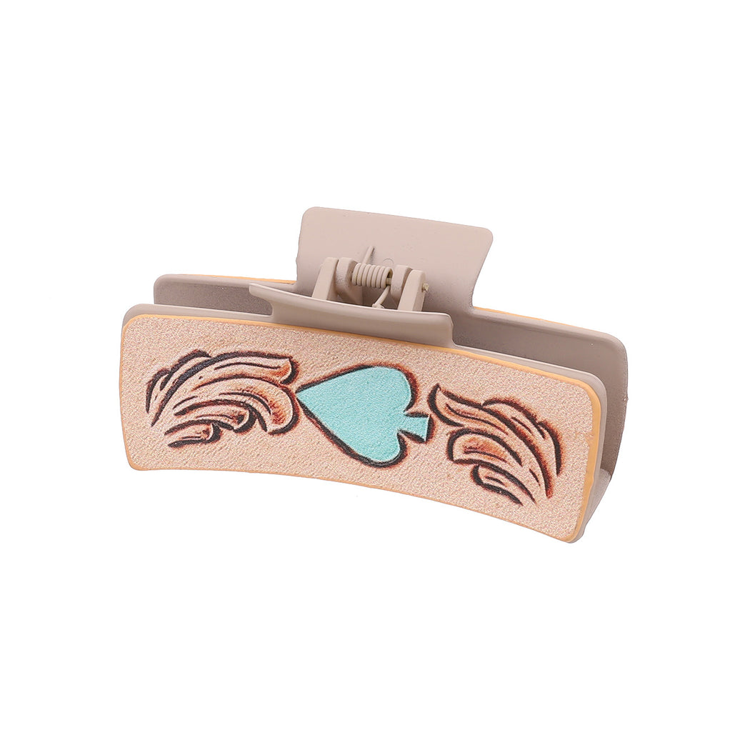 Mint heart hair claw on white background