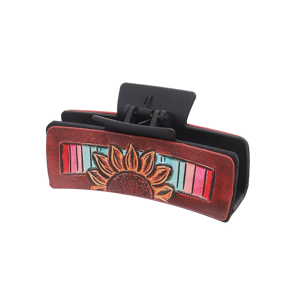Red sunflower hair claw on white background