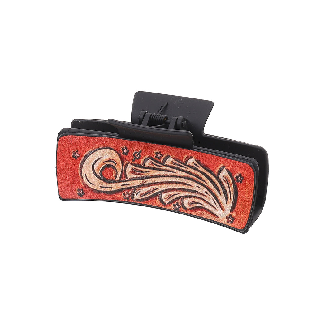 Red paisley hair claw on white background
