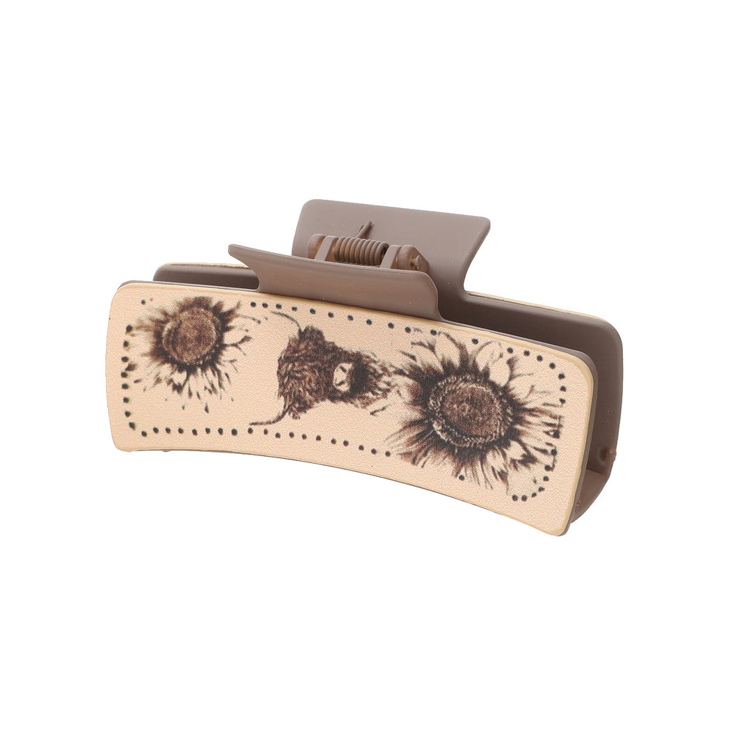 Sunflower hair claw on white background