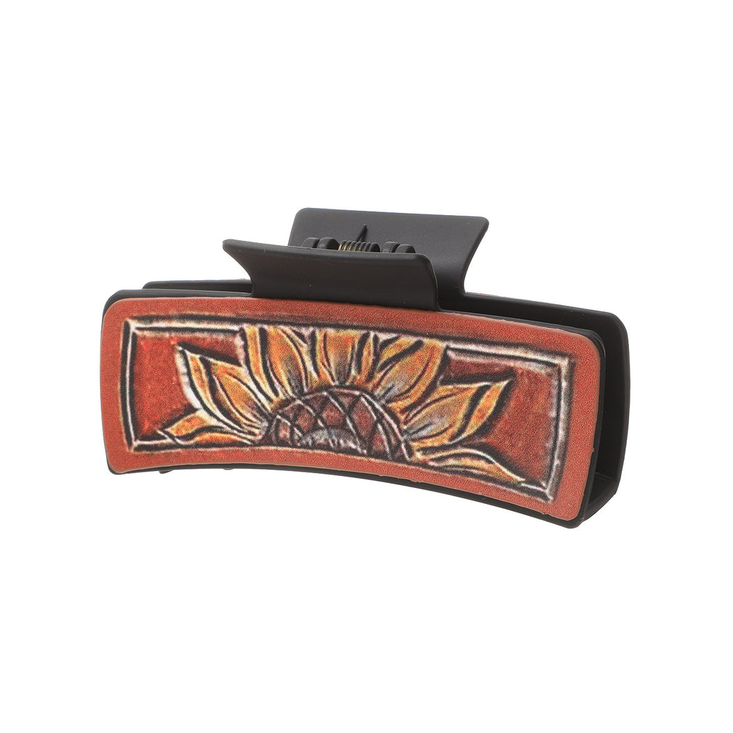 Red sunflower hair claw on white background