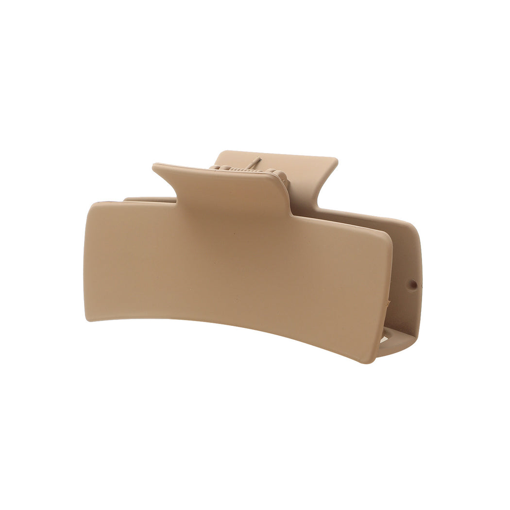 Beige hair claw on white background