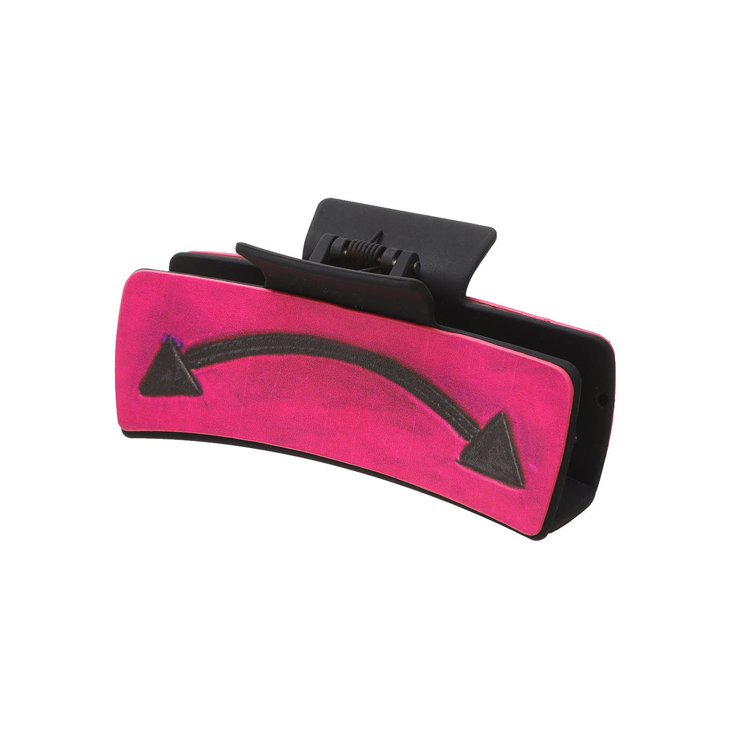 Pink arrow hair claw on white background