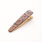 Coral floral elongated barrette on white background