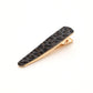 Black leopard elongated barrette on white background