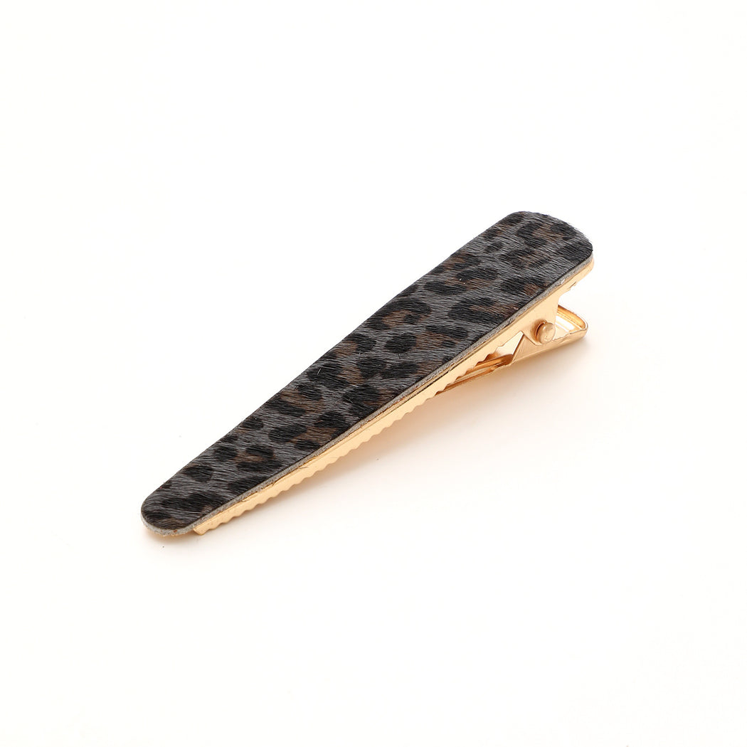 Black leopard elongated barrette on white background