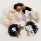 Marbled Bow Scrunchie Collection showing multiple available variants