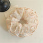 Gifty chiffon scrunchie with tiny floral print in pastel colors