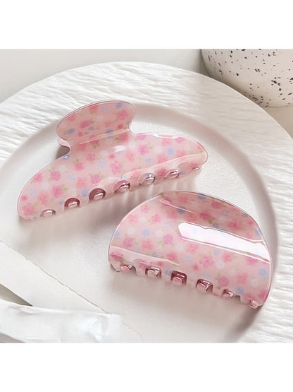 Side view of Beau Sweet Pink Floral Print Hair Claw Clip highlighting clip teeth