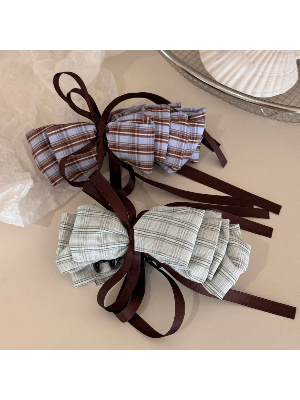 Beau delicate bow hair clip displayed on a white background