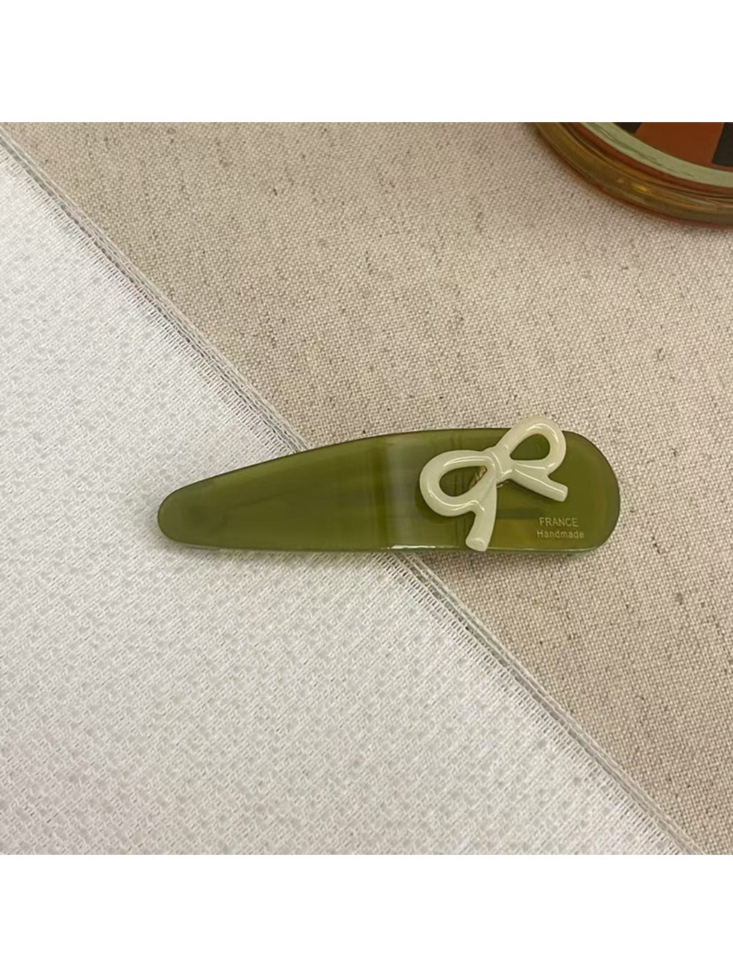 Beau - Bow Embellished Oval Hair Clip