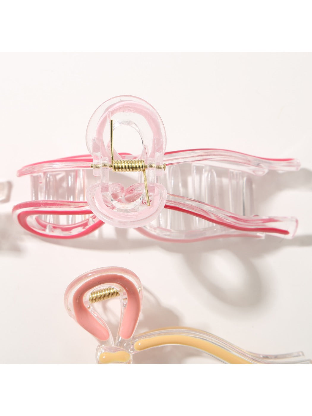 Close-up of Beau Sweet Ribbon Knot Hair Clip showing fabric texture and knot detail
