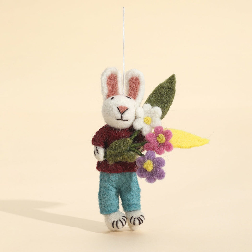 Red sweater rabbit character keychain, front view