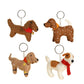 Dog breed character keychain in four visible styles, overview
