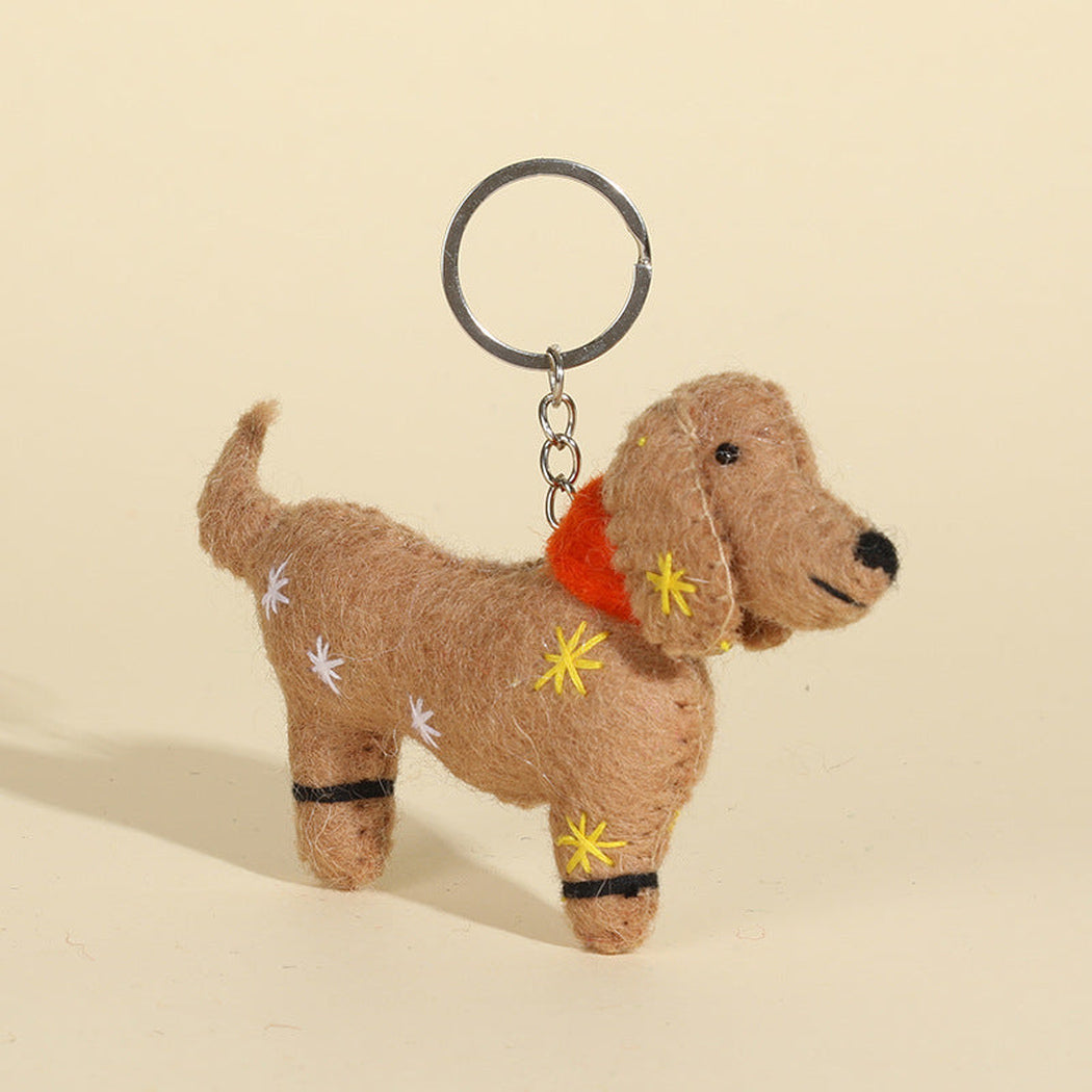 Embroidered dachshund character keychain, front view