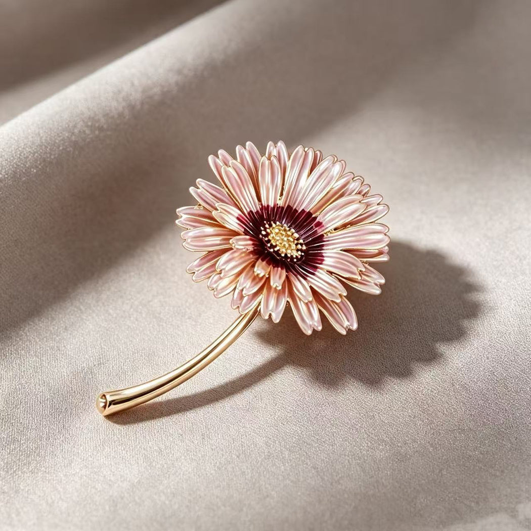 Pink-centered daisy brooch, front view