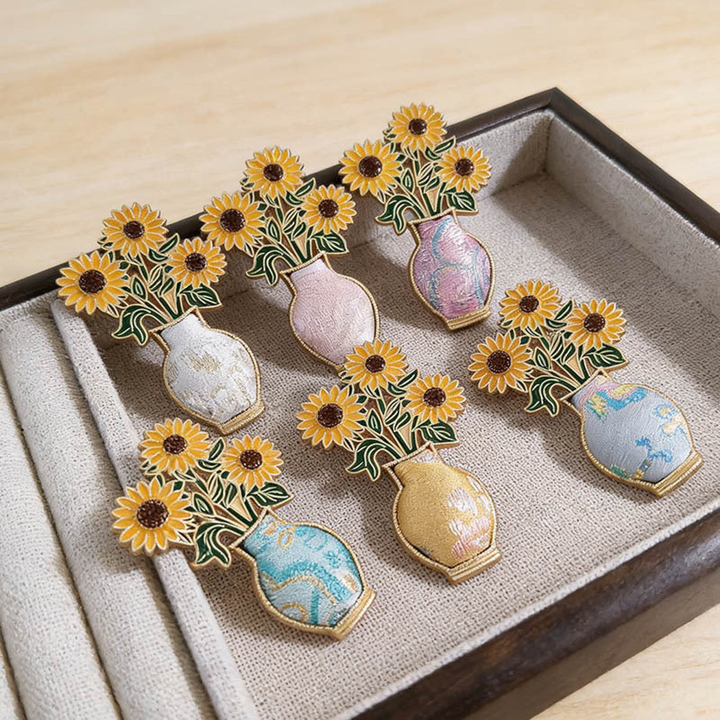 Sunflower vase pattern brooch in six visible styles, overview