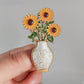 White vase sunflower brooch, front view