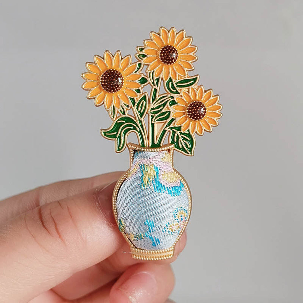 Blue vase sunflower brooch, front view
