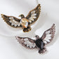 Spread-wing eagle heart accent brooch in two visible styles, overview
