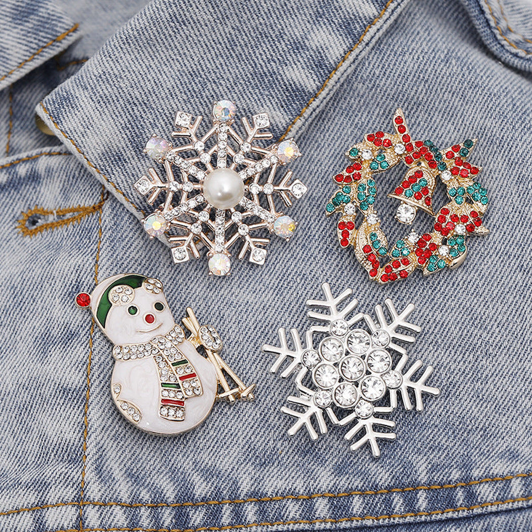 Christmas sculpted motif brooch in four visible styles, overview