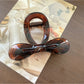 Beau - Cutout Bow Tie Hair Claw Clip