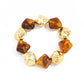 Lovra vintage beaded link bracelet displayed with complementary jewelry pieces