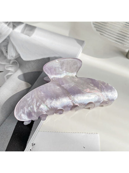 Top view of Beau claw clip emphasizing pearlescent color and shape